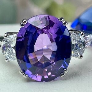 7.35ct Blue/Purple Sapphire w/white Sapphire accents Silver Ring.